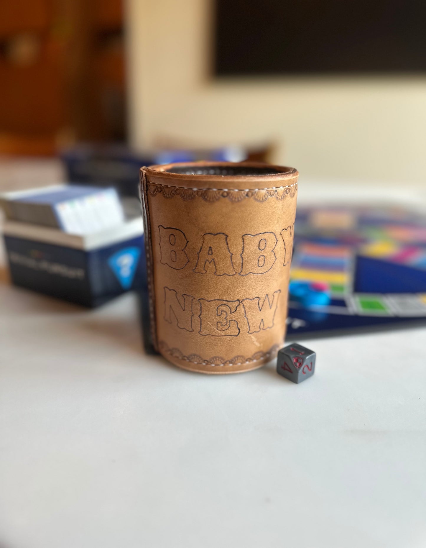 handmade leather dice cup "baby needs new shoes"